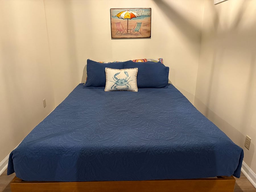 Queen bed in basement