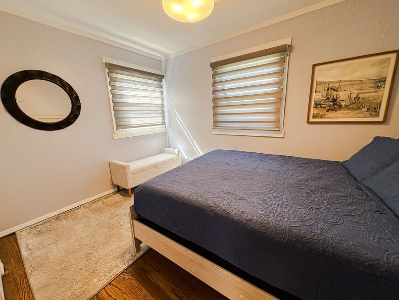 Bedroom with queen bed & closet