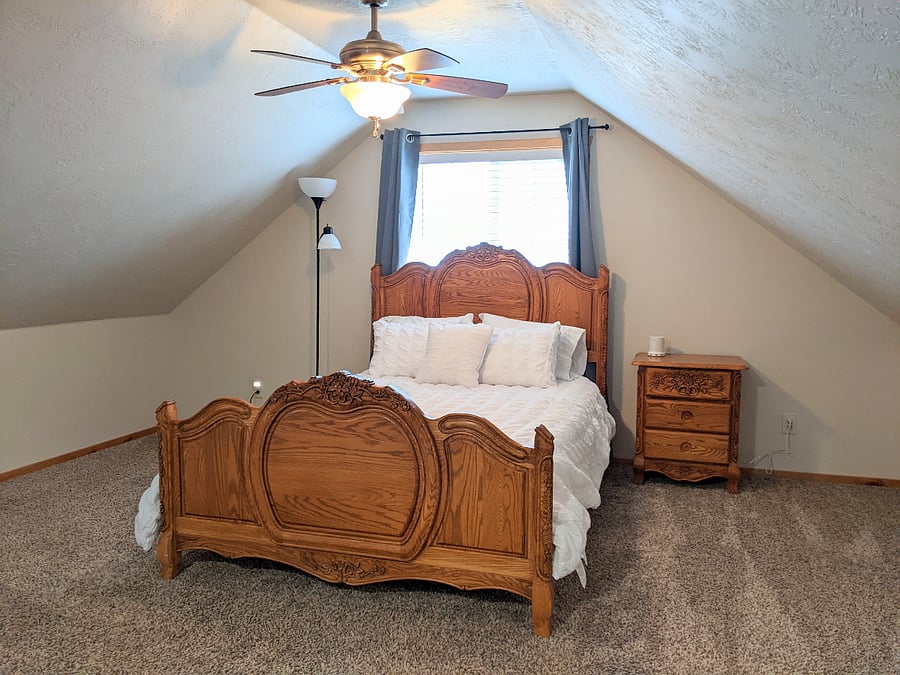 Huge loft bedroom above the 4 car garage. Beautiful queen bed frame with medium tempur-pedic mattress. This is a spaciously large room equipped with your very own tv, dressers, a closet dresser, mini refrigerator, microwave, blackout curtains, queen pullout sofa couch and a private full bathroom.