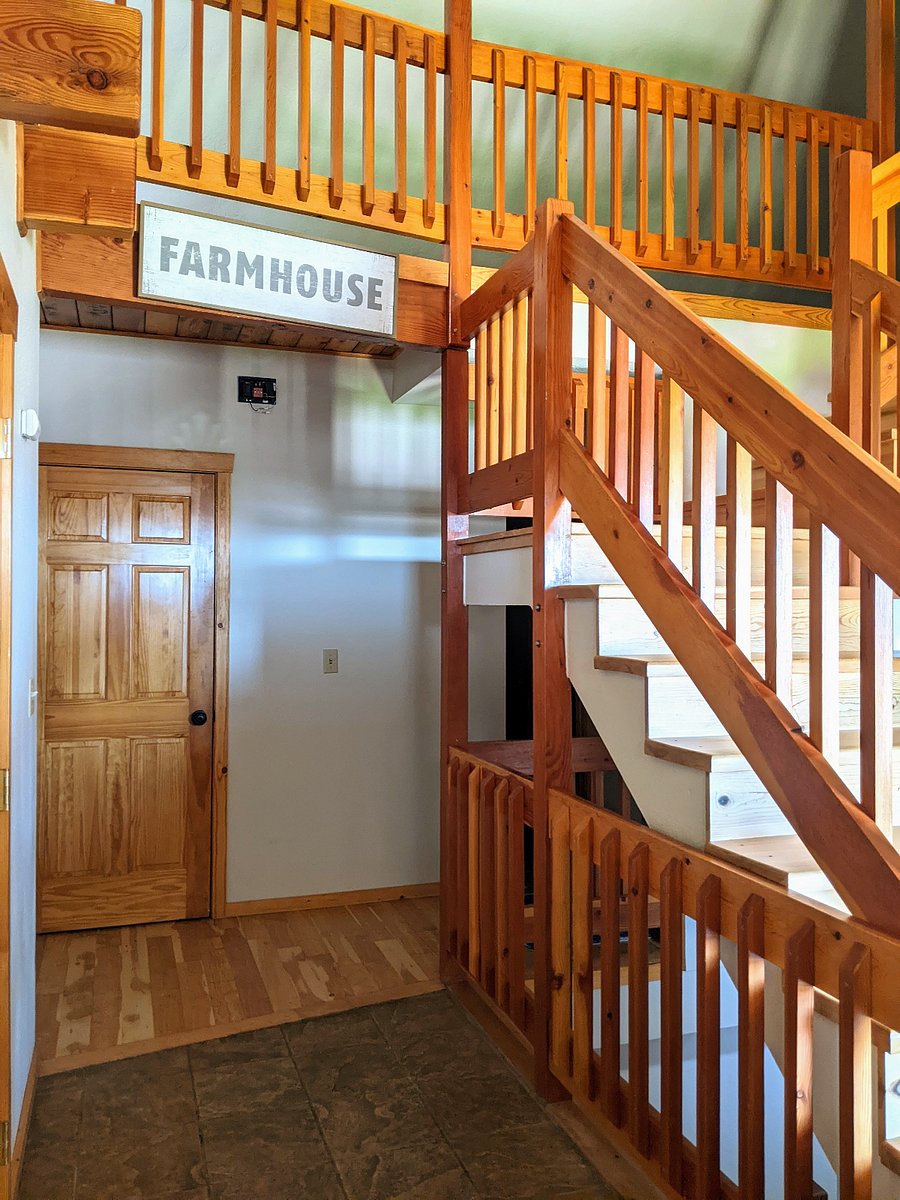 Split entryway with a staircase to the loft.