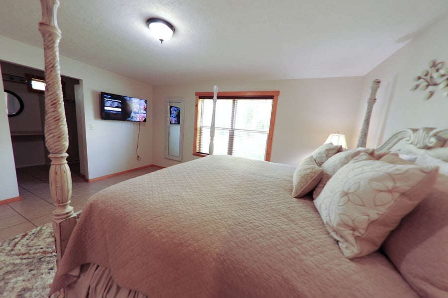 Spacious master bedroom with King bed and tv. 