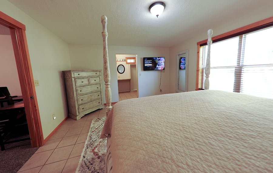 Spacious master bedroom with King bed and tv. 