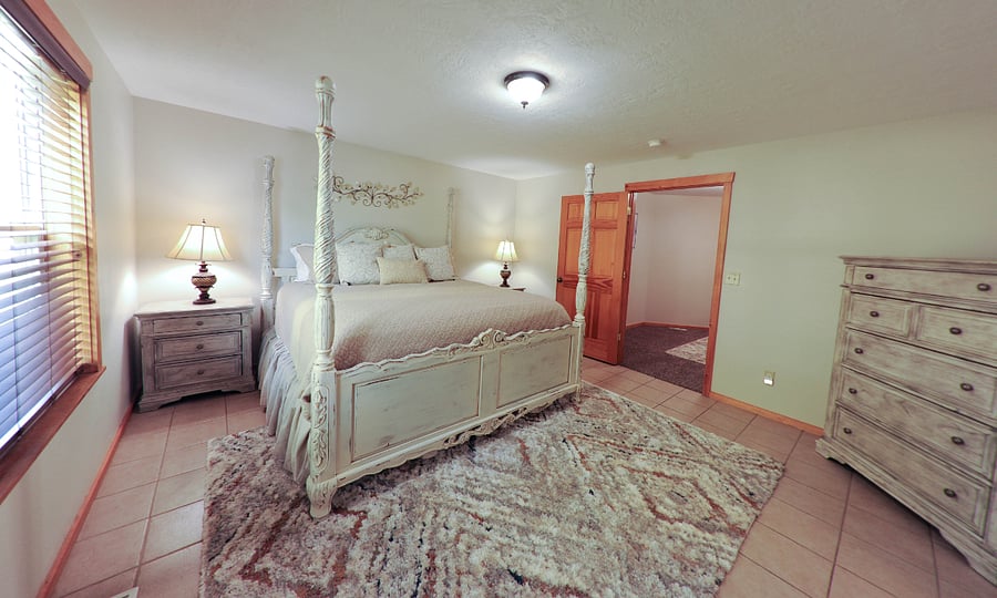 Spacious master bedroom with King bed and tv. 