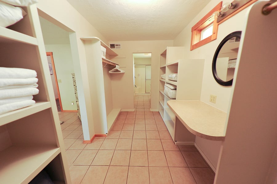 Walk-in closet with linens.