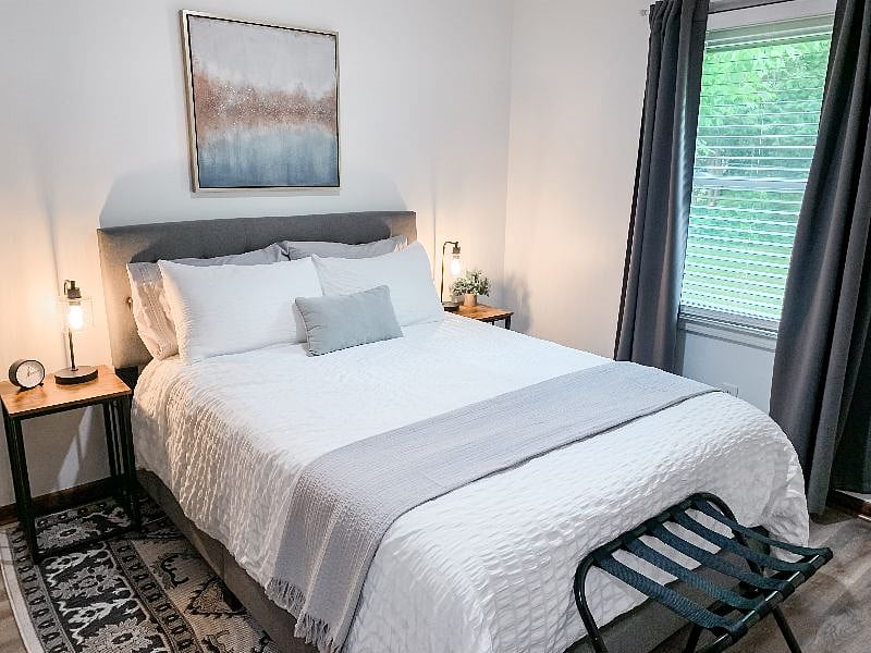 Bedroom 2 Featuring a Queen Bed w/ Plush Bedding