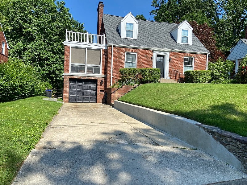 The walkway to your ground level private entrance is along a paved walkway to the left of the garage.