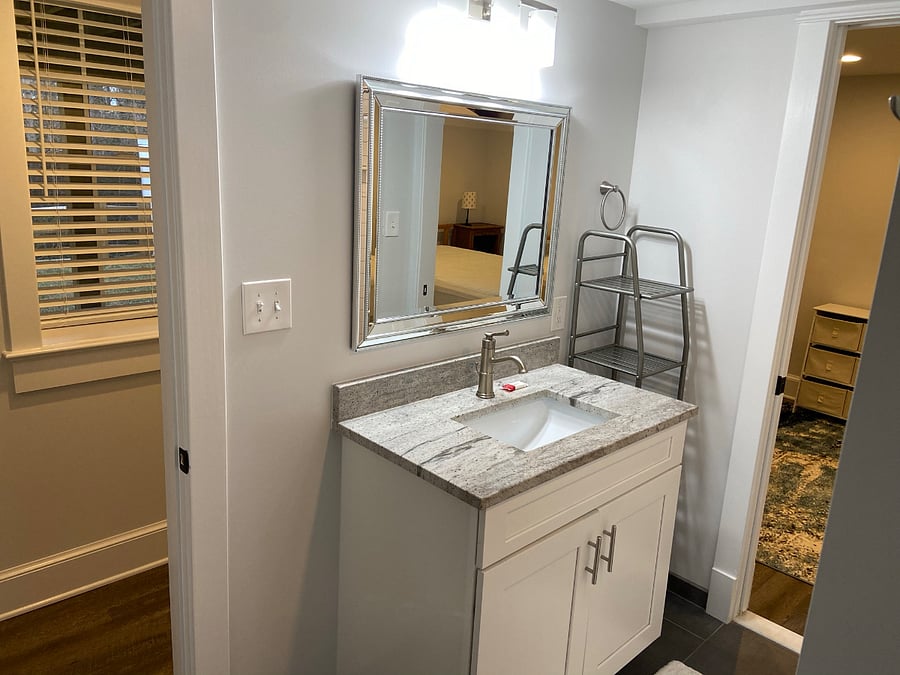 Enter the bathroom from the bedroom and/or the hallway for privacy when you have guests.