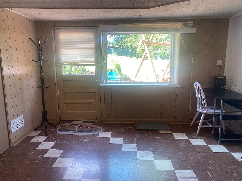 Private entrance with patio outside the widow