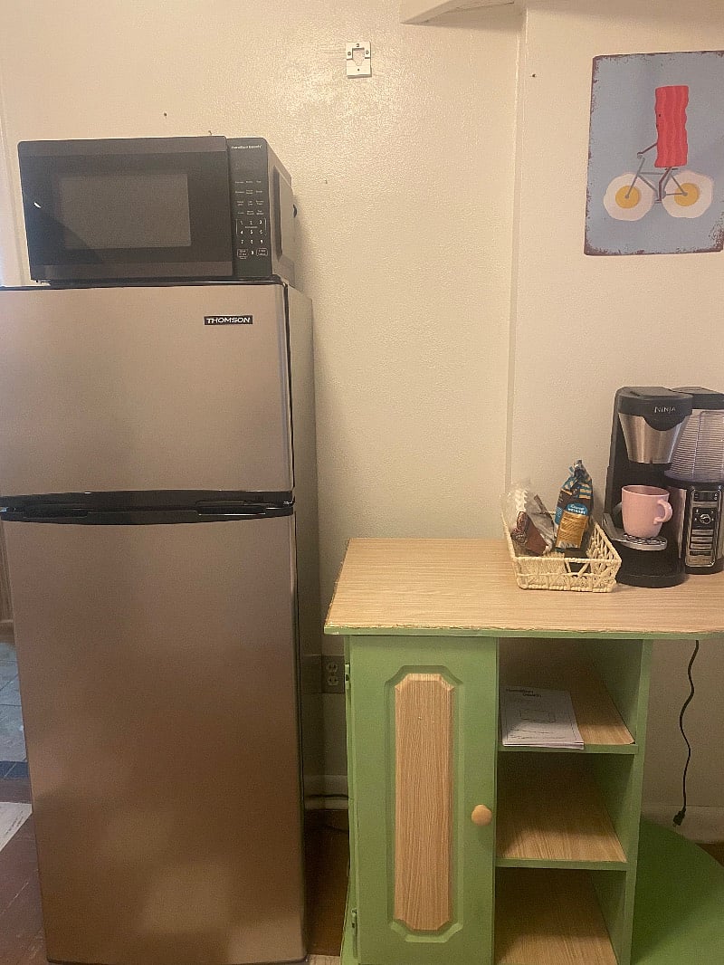 Fridge, micorwave, coffee maker, toaster oven/air fryer, hotplate.