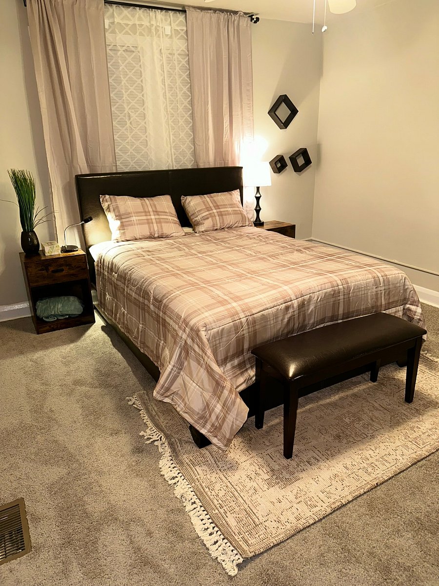 Loft Suite bedroom with dresser and closet