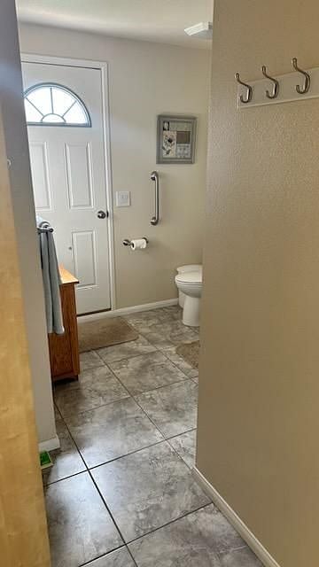 Entry to backyard through bathroom