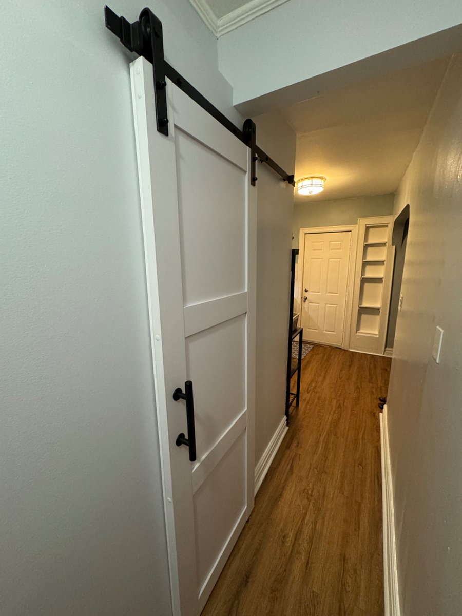 This is the hallway from the living room to the bathroom and kitchen.