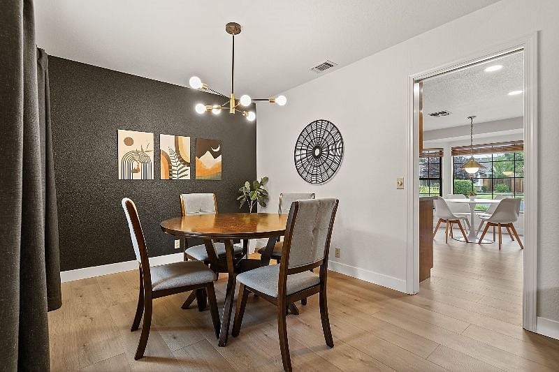 Dining room with access to kitchen.