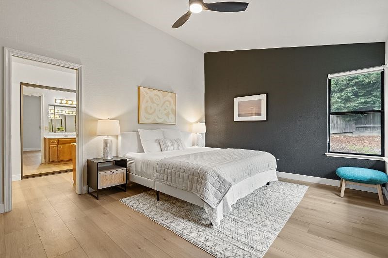 Primary bedroom with soaring ceilings