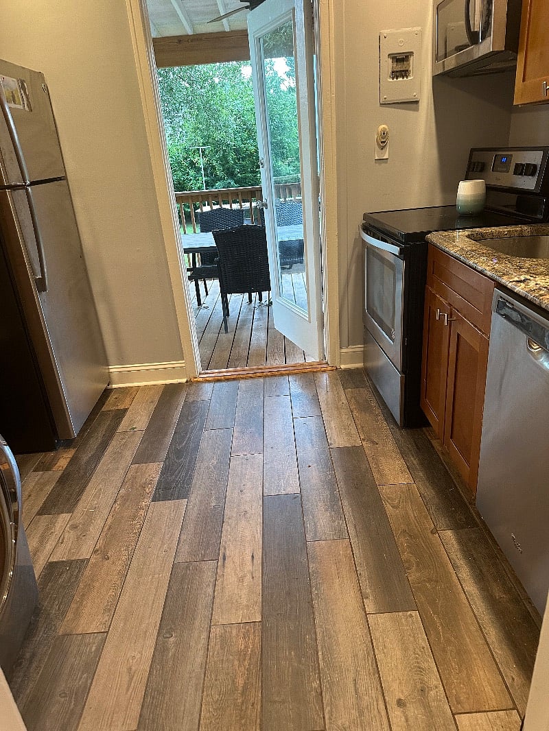 Kitchen includes: Granite counters tops, Stainless Steel Stove, full sized stainless steel refrigerator, and dishwasher.