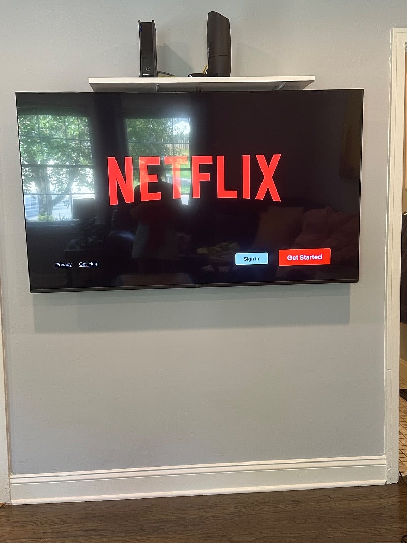Brand new 65 inch smart TV with streaming services via Roku.