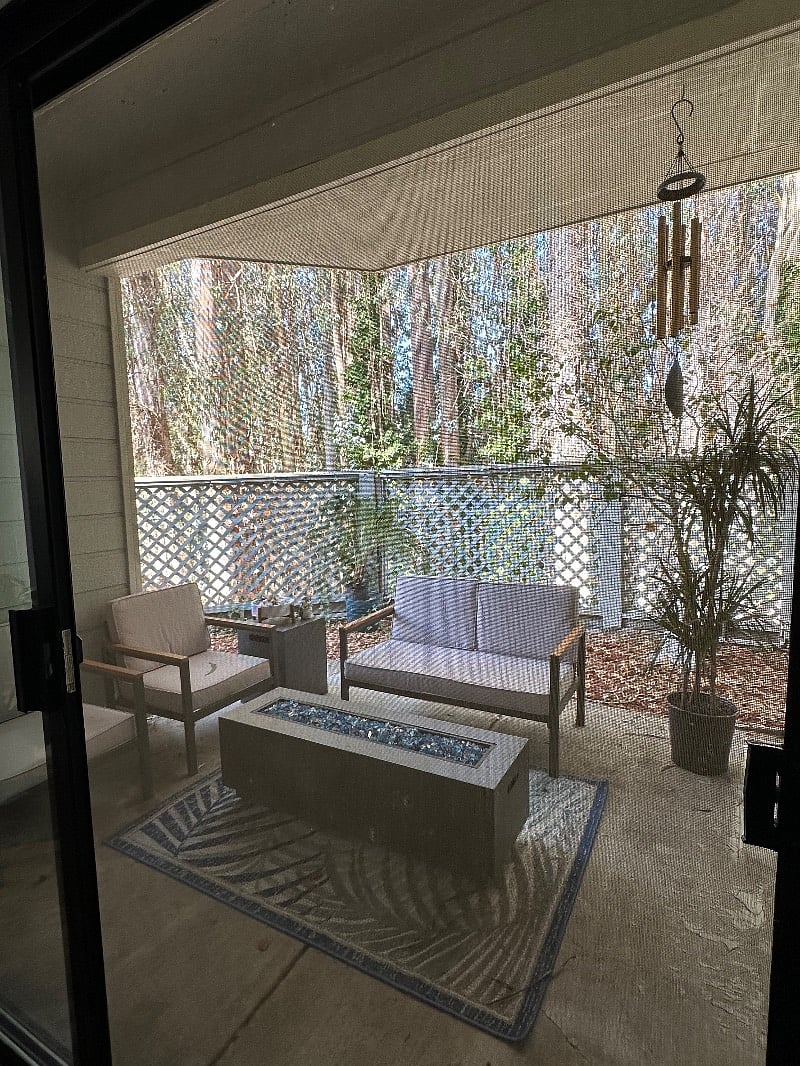 patio off the dining room. Not pictured is an egg chair that is off of the patio in the living room