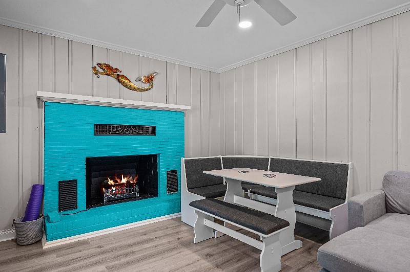 Electric fireplace and dining area.