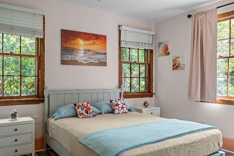 Another view of the master bedroom, fully furnished.
