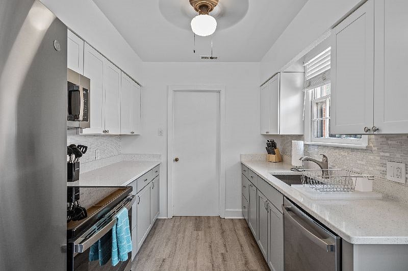 Kitchen photo facing laundry room door.
