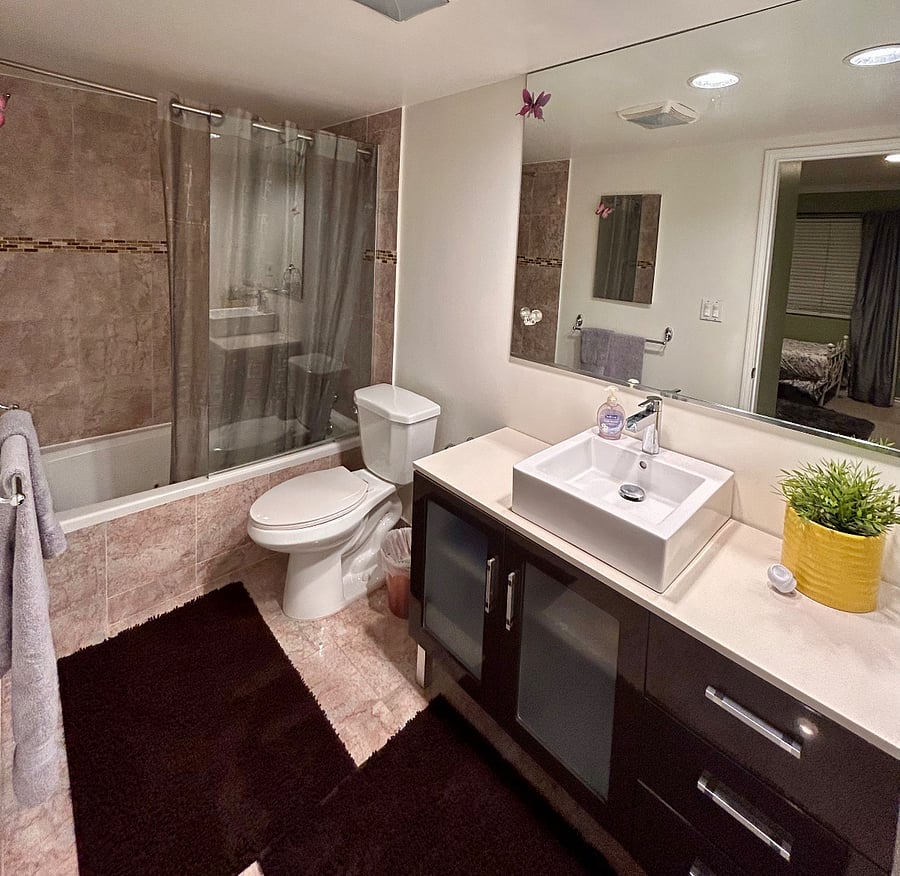 your private full-bath with a jacuzzi tub from door entry