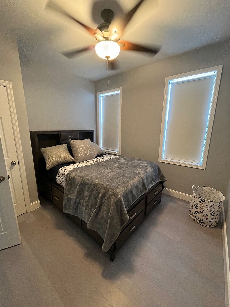Full size private Bedroom with storage in bed and standard closet