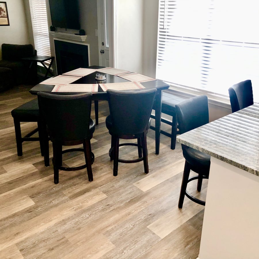 Dining room seats 6 and 2 at kitchen counter