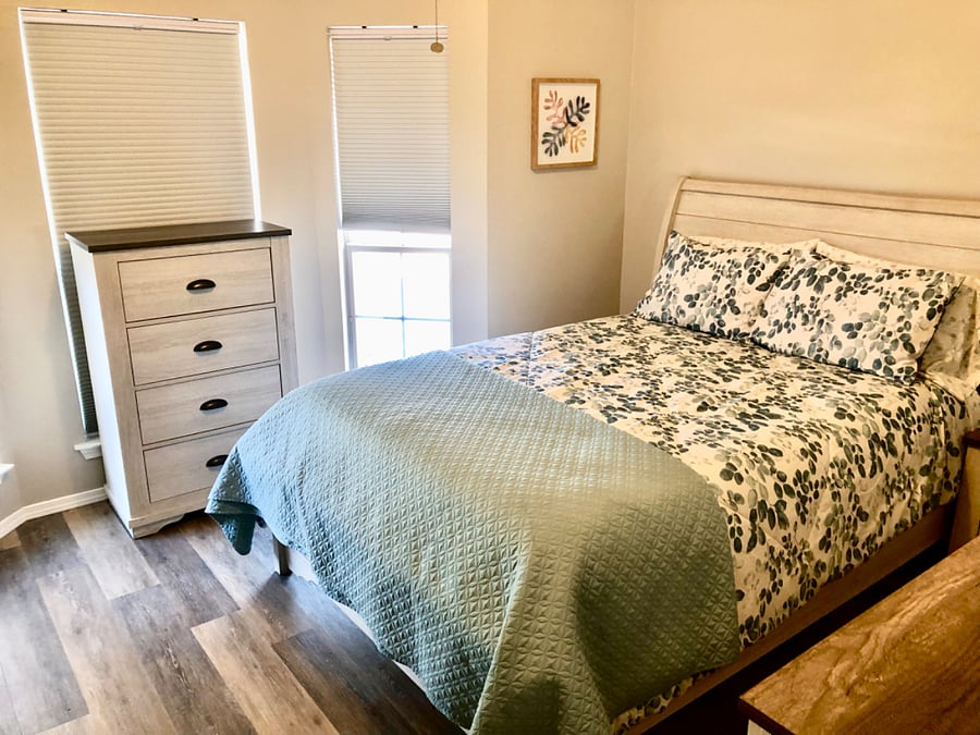 Bedroom #3 with queen bed, dresser, chest, nightstand, smart TV and closet