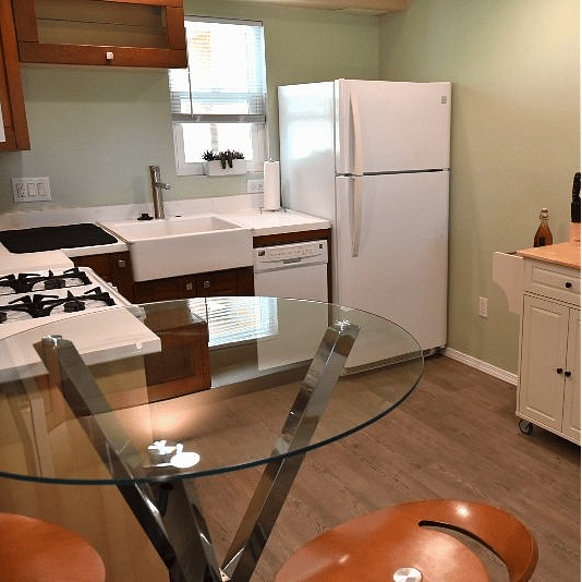 Another view of Kitchen showing movable island for food preparation