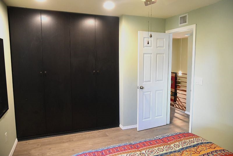 Bedroom closets provide plenty of space for clothing.