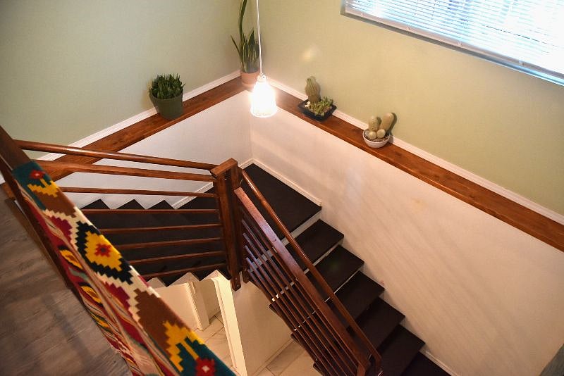 Stairs were designed to allow daylight into the basement Living Area.