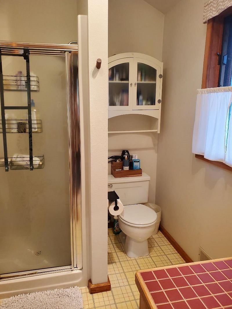 Master bathroom with stall shower