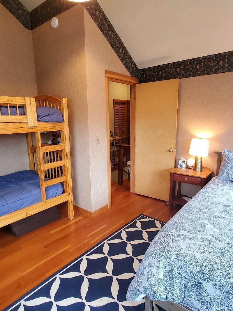 Bedroom 3 has queen bed with a set of bunk beds