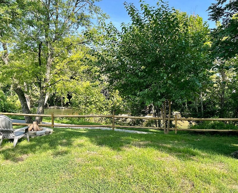 Fire pit. Roanoke River and Greenway accessed from the back yard.