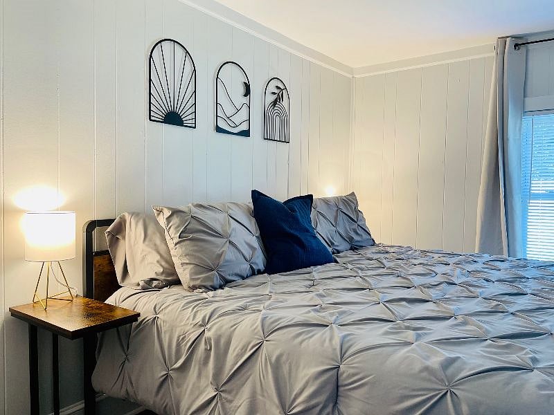 Bedroom #1: Includes king-sized bed, closet, dresser and blackout drapes.