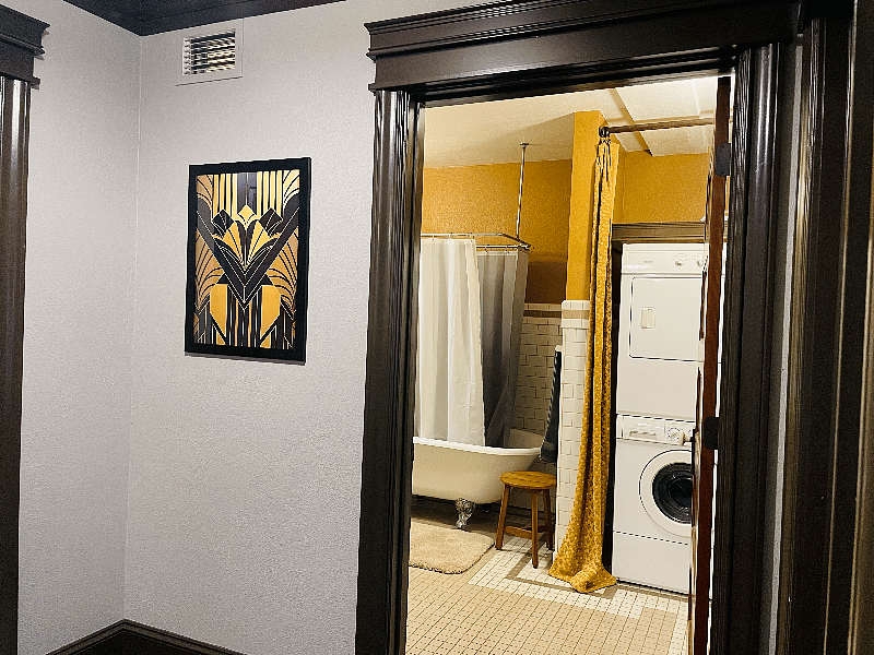 Stackable washer and dryer in bathroom