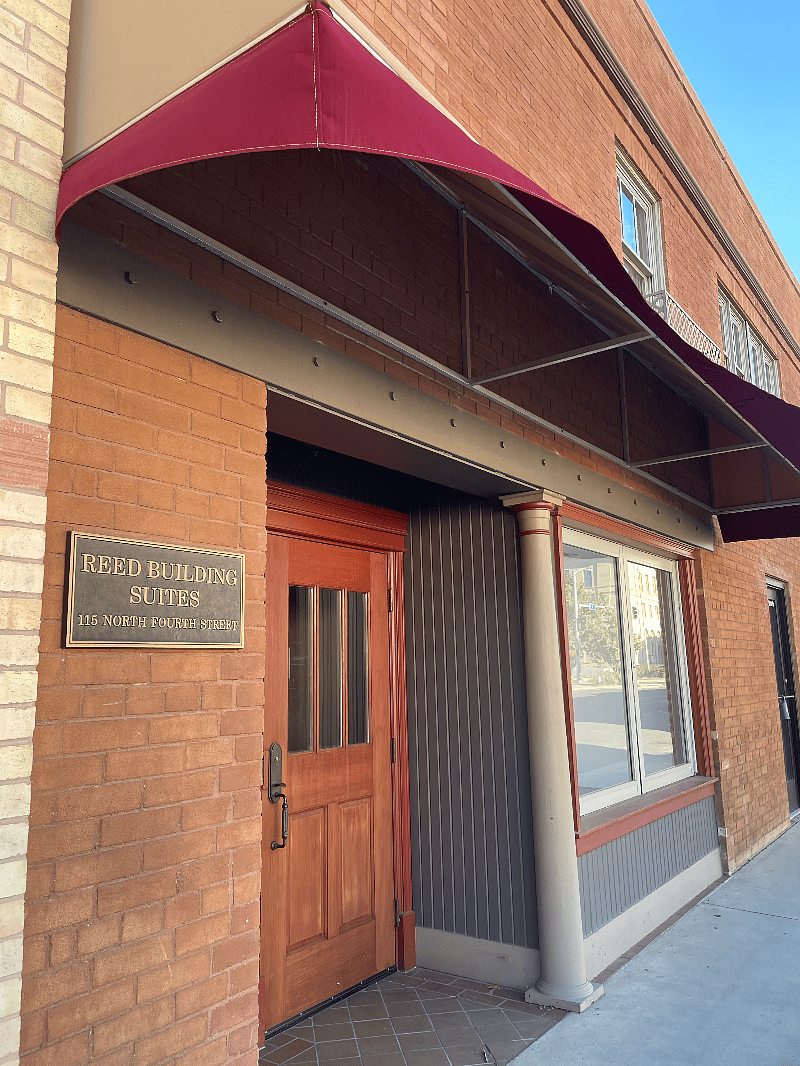 Side entrance leading to stairs to unit