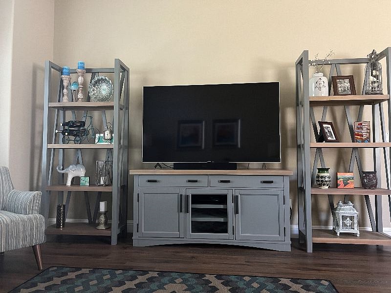 65 inch TV with sound bar.