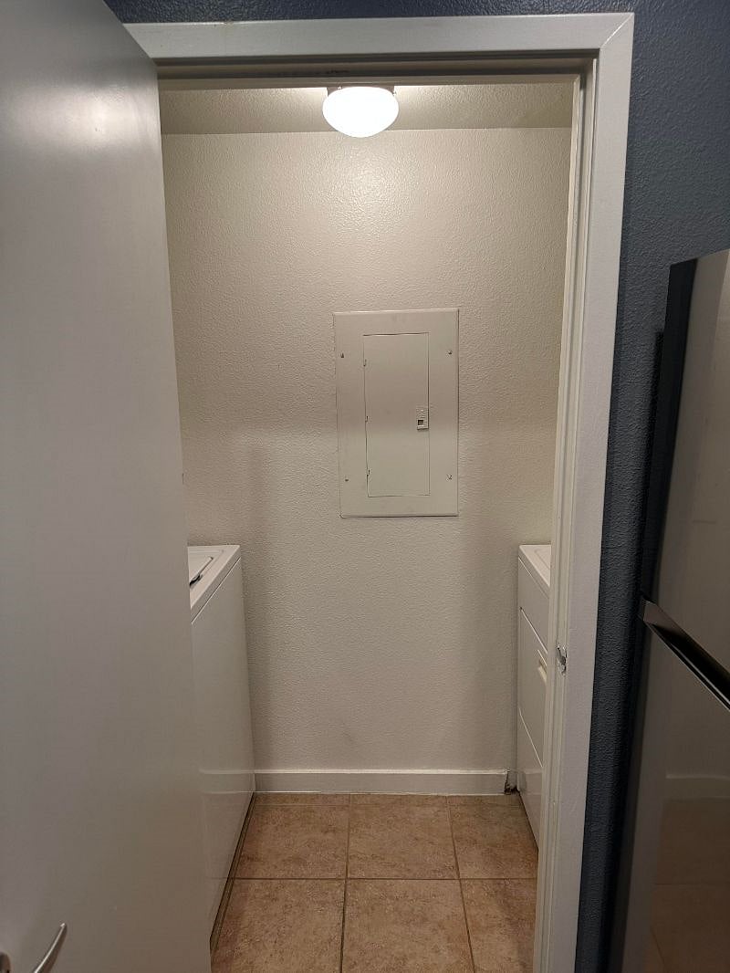 Laundry room access in kitchen.