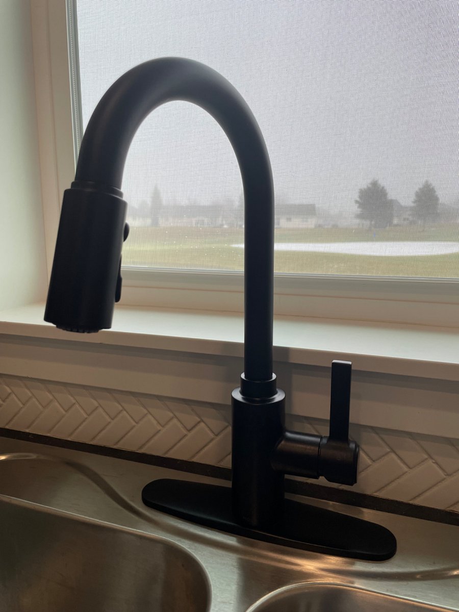 Enjoy watching golfers and nature while you wash dishes.