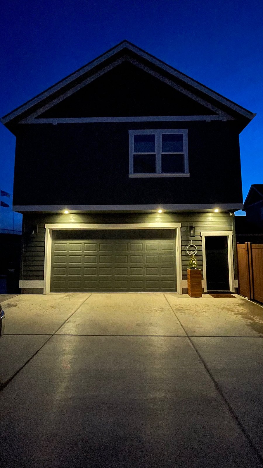 Private entrance with entry lighting