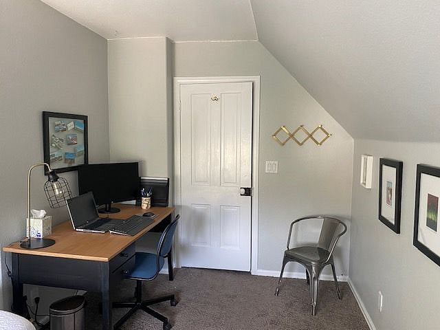Office area includes desk with monitor keyboard, mouse, and printer.