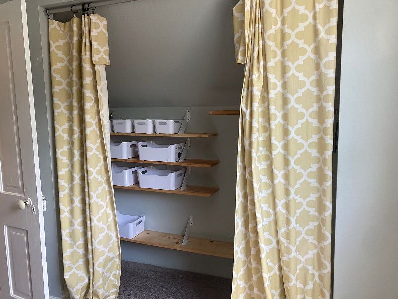 Hanging space, shelving and bins make organizing your stuff easily
