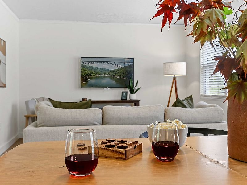 Need to unwind after a day of work in the NRG? Our cozy living room is the perfect spot to relax and recharge. Sink in and let the stress melt away.