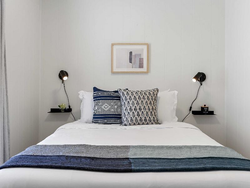 Experience heavenly slumber with our sumptuous bedroom setup! Our soft cotton linens, queen size bed, blackout curtains, and 2" privacy blinds will take you on a sweet dream journey.