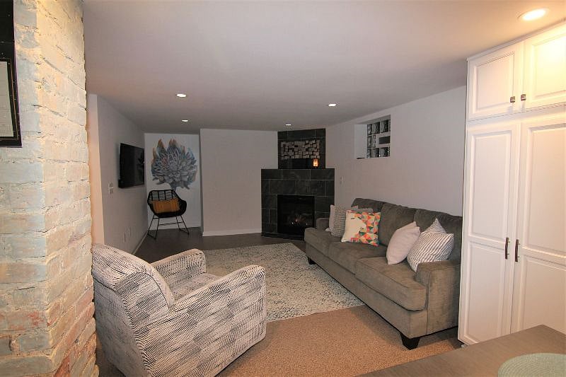 this one shows the TV on wall (some of the other photos were taken prior to TV installation)