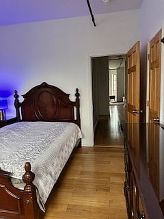 bedroom #1, queen bed, dresser nightstand + mirror and desk/chair; en suite bath