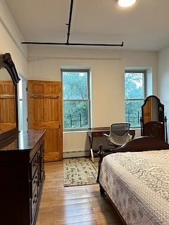 bedroom #1, queen bed, dresser nightstand + mirror and desk/chair; en suite bath