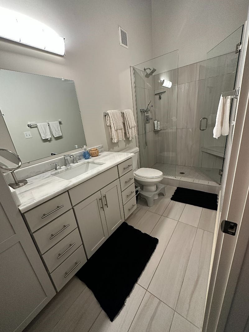 Primary Bathroom with walk-in shower attached to primary bedroom
