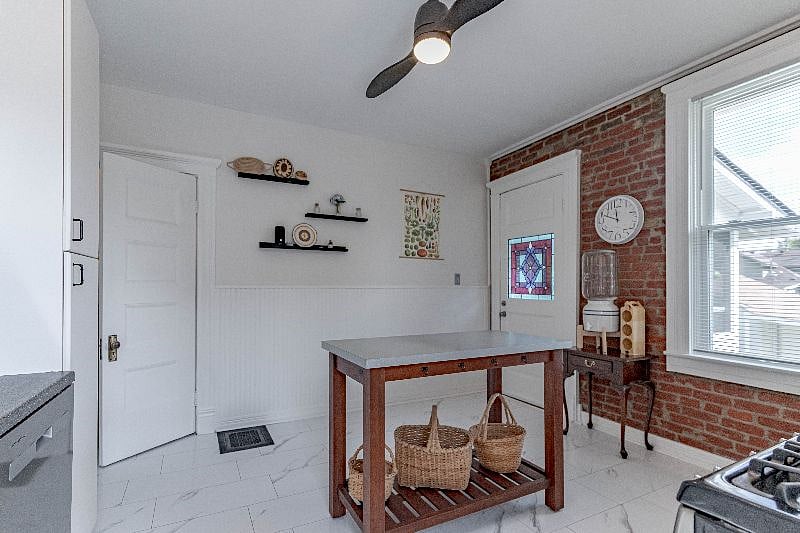 Door pictured on the left in photo is pantry closet with stackable washer & dryer inside.